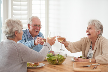 Image showing Wine, toast and senior friends at lunch in home with smile, celebration and bonding in retirement. Food, drinks and cheers with glass, old man and women at dinner table together for happy brunch.