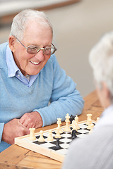 Image showing Chess, game and happy outdoor with old people together in retirement to relax on holiday or vacation. Elderly, friends and person smile for winning competition, checkmate or activity with strategy