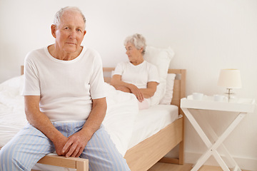 Image showing Senior, couple and stress in bedroom with conflict, ignore and crisis in marriage for mental health and retirement. Elderly, woman or man with fight, sad and divorce on bed in home with disagreement