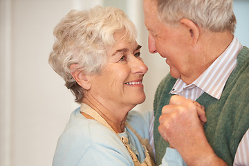 Image showing Elderly, couple and happy with dancing in home for bonding, support and holding hands with romance. Senior, man and woman with hug, embrace and smile for relationship, dancer and love with affection