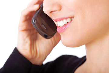 Image showing Mouth, closeup and person with phone call for communication, contact and virtual chat. Cellphone, conversation and woman smile for easy connection with technology in studio or white background