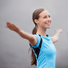 Image showing Healthy, fitness and woman with open arms, excited and exercise with progress and achievement. Person, athlete or girl with celebration or runner with wellness or workout with smile, foggy or freedom