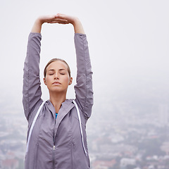 Image showing Fitness, running and stretching with sports woman outdoor in mountains for morning cardio training. Exercise, health and wellness with young runner or athlete getting ready for workout in mist