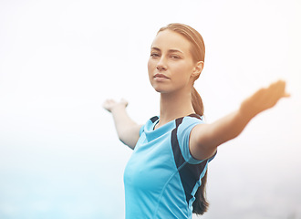 Image showing Portrait, fitness and stretching with sports woman outdoor in mountains for morning cardio training. Exercise, health and wellness with confident young runner getting ready for workout in mist