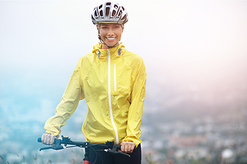 Image showing Portrait, fitness and woman with bike in mountains for morning exercise, training or off road hobby. Cycling, smile and sports with happy young athlete in countryside or nature for workout ride