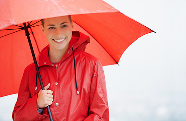 Image showing Woman, portrait and umbrella for insurance, outdoor nature and protection from rain in cold weather. Female person, secure and safety or shield from storm, winter and travel to Scotland for holiday