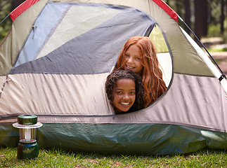 Image showing Happy, portrait and children in tent on camp for outdoor adventure, vacation or holiday for fun. Smile, bonding and young girl kids excited together for summer weekend trip in forest, field or woods.