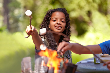 Image showing Fire, marshmallow and kids in nature for camping, learning or fun bonding in a park together. Bonfire, family or children in a forest for candy puff roast, cooking or campfire tradition in nature