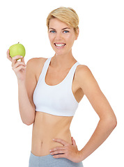 Image showing Woman, portrait and apple in studio for fitness, wellness or diet on white background, mockup or backdrop. Model, dietician or nutritionist with green fruit for cleanse, vitamins and workout