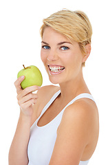 Image showing Fitness model, portrait and health with apple for studio wellness, diet and by white background, mockup or backdrop. Woman, dietician and nutritionist with fruit for breakfast food, vitamins or detox