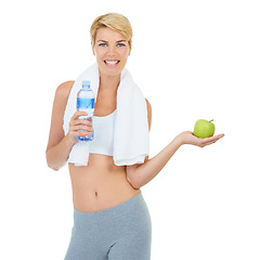 Image showing Woman, portrait and water with apple for health and fitness, hydration and nutrition on white background. Sports, wellness with healthy food and drink in bottle, fruit for diet and to lose weight