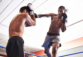 Image showing Men, kickboxing and jumping for fight in ring, fitness and topless for exercise and workout. People, bodybuilders and performance for challenge or practice, train and combat for competition in sports