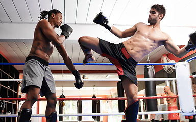 Image showing Kickboxing, fight and men training for fitness and sport in gym, coach and athlete with workout and action. Energy, challenge and MMA with athlete together in ring for boxing, exercise and endurance