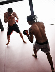 Image showing Boxing, men and gloves in ring with exercise to train for fight, fitness and competition with practice for match. Mma, male and fighter with determination, workout and kickboxing sport for challenge