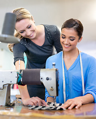 Image showing Designers, collaboration and sewing machine for manufacturing, coworkers and tailor on fabric. Women, teamwork and support on textile in clothing business, fashion planning and partnership on style