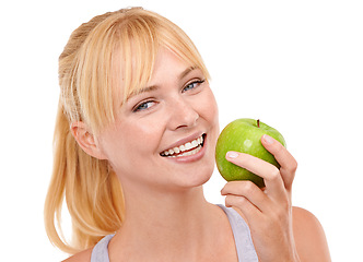 Image showing Smile, studio and portrait of woman with apple for vegan, diet and nutrition benefits for wellness. Food, face and happy person with fruit for vitamin c, detox and gut health on white background