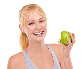 Image showing Portrait, studio and happy woman with apple for diet, benefits or food to lose weight. Healthy eating, nutrition and face of girl with fruit for body wellness, digestion and smile on white background