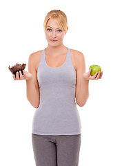 Image showing Portrait, food and woman with choice of apple, dessert or healthy eating food to lose weight in studio. Doubt, face and girl with fruit vs cake, decision for diet or nutrition on white background.