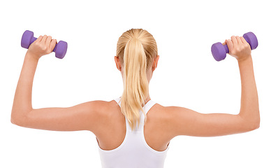 Image showing Woman, dumbbell and studio exercise for arm workout on white background for challenge, strength or mockup space. Female person, weightlifting and back view for training fitness, performance or muscle