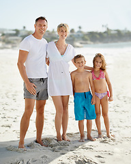 Image showing Parents, children and portrait on beach in summer for holiday on island or bonding, connection or vacation. Man, woman and siblings with face in Florida together or outdoor happiness, travel or relax