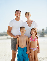 Image showing Parents, children and portrait on beach for holiday relax on island or bonding, connection or vacation. Man, woman and siblings with face in Florida together or outdoor happiness, travel or summer