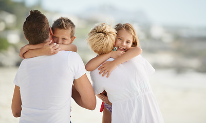 Image showing Smile, beach and children hugging parents with love on travel vacation, holiday or adventure. Happy, care and young kids embracing mother and father by tropical ocean or sea on weekend trip together.