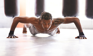 Image showing Portrait, fitness and push up with black man on floor of gym for training strong muscles or power. Exercise, health and body with confident young athlete in workout to improve physical wellness