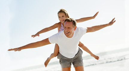 Image showing Father, child and airplane on beach holiday together or flying game on summer vacation, bonding or travel. Man, daughter and happy at ocean on back in Florida or paradise island, relax or outdoor