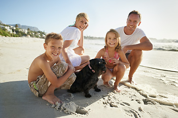 Image showing Parents, children and portrait on beach with dog for relax holiday vacation in summer for family, bonding or travel. Mother, father and siblings with animal pet on Florida seaside, together or break