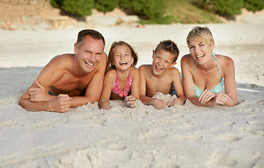 Image showing Parents, children and beach with adventure in summer on vacation for bonding and happiness in Florida. Family, smile and travel for holiday with kids to relax, fun and enjoy trip in seaside.