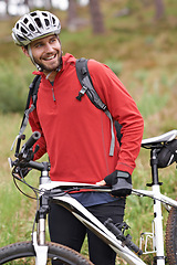 Image showing Smile, bike and man cycling in countryside for adventure, discovery or off road sports hobby. Fitness, health and wellness with happy young cyclist on bicycle in nature for cardio training or workout