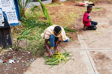 Image showing Vendors in Bahir Dar sell handcrafted grass headbands, a symbol of Easter celebrations. Ethiopia