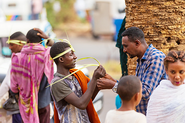 Image showing Vendors in Bahir Dar sell handcrafted grass headbands, a symbol of Easter celebrations. Ethiopia