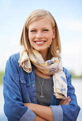 Image showing Portrait, outdoor and woman with arms crossed, smile and fashion with weekend break and casual outfit. Face, park and person with stylish clothes and girl with happiness and summer with nature or joy