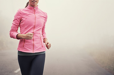 Image showing Fog, fitness and person running on road outdoor for healthy body, wellness and training for sports on mockup space in winter. Mist, exercise and athlete workout for cardio, race or energy in nature