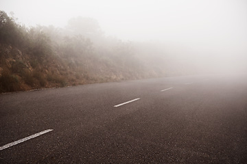 Image showing Road, landscape and fog outdoor on highway for travel, vacation or holiday in spring on a background. Asphalt, environment and street with mist in countryside, nature or path in the morning in Sweden