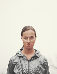 Image showing Woman, portrait and fitness in nature with fog for hiking, exercise or workout outdoor with confidence. Athlete, person and face with mockup space for running, training or sportswear for healthy body
