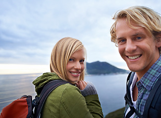 Image showing Hiking, happy and portrait of couple on mountain with backpack for love, trekking and explore landscape. Travel, nature and man and woman by scenic view on holiday, vacation and outdoor adventure