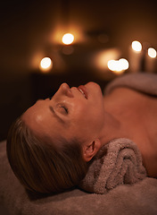 Image showing Face massage, spa and wellness with woman, luxury and candle with hospitality and peace. Person, facial and girl with stress relief or healthy with vacation or beauty with holiday, detox or self care