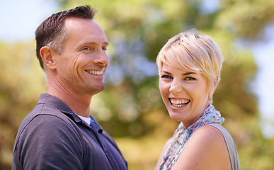 Image showing Portrait, couple and love with smile in outdoor in happiness, affection and romance for date. Park, relationship and together with bonding for care, satisfied and trust with commitment and support