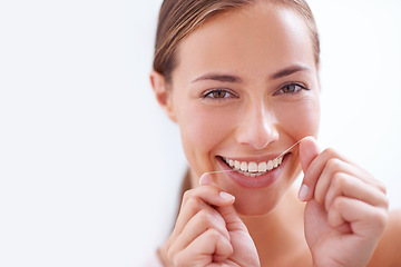 Image showing Woman, teeth and floss in portrait for dental hygiene with closeup, morning and cleaning mouth for dentistry. Female person, tooth care and routine for healthy, face and fresh smile for beauty