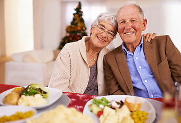 Image showing Christmas, smile and portrait of senior couple in home for dinner, bonding and happy together at party. Xmas, face and elderly man with woman at table, food and love of people on festive holiday
