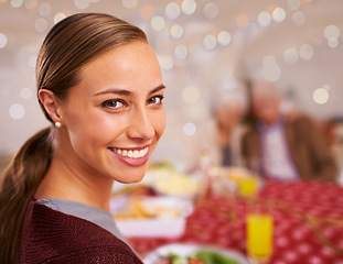 Image showing Portrait, Christmas and woman with her family, meal and relaxing with festive season and healthy dinner. Face, girl or people with social gathering or home with smile or Xmas with holiday food or joy