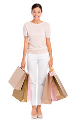 Image showing Woman, portrait and shopping bags or excited for fashion or customer discount, promotion or giveaway. Female person, face and boutique product on white background or purchase, retail or mockup space