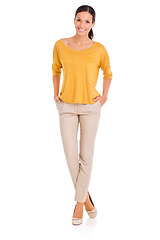 Image showing Female person, fashion and portrait for happy, body and startup in outfit in studio for minimalist style. Woman, smile and yellow top by white background, hand in pocket and confident in apparel