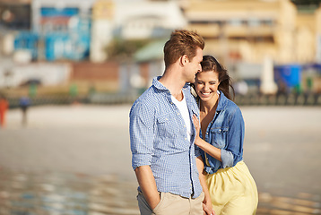 Image showing Couple, laugh and walk on beach for romantic date, jokes and bonding together on holiday in Italy. Happiness, boyfriend and girlfriend for funny outing or rest and relaxation on summer getaway