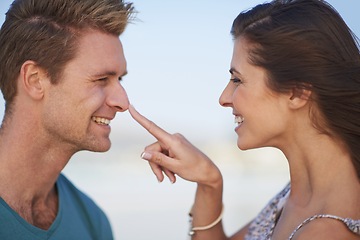 Image showing Couple, laugh and touch nose on playful date, romantic getaway or summer vacation in South Africa. Smile, boyfriend and girlfriend in love for sweet relationship, joyful outing and bonding together