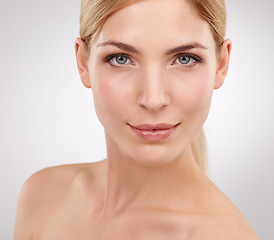 Image showing Beauty, cosmetics and portrait of woman with luxury care, confidence and natural facial in studio. Dermatology, healthy skin and face of girl on white background with skincare, glow and wellness.