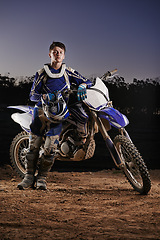 Image showing Extreme sport, portrait and man with off road motorcycle, confidence and gear for competition, race or challenge. Adventure, adrenaline and serious face of athlete on course with dirt bike in evening