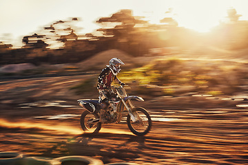 Image showing Motion blur, race and man on dirt bike with adventure, adrenaline and speed in competition, Extreme sport, dust path and athlete on off road motorcycle for challenge, power or danger on fast course